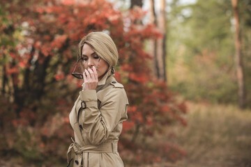 Fototapeta na wymiar Autumn clothes and accessories collection for ladies. Concept of fancy style