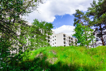 Abandoned high-rise buildings, city. Clean quarts and buildings without windows or doors.