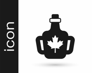 Black Bottle of maple syrup icon isolated on white background. Vector