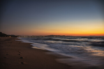 Sunset at a sandy beach on Corfu island - Greece