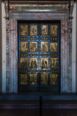 View to one of the doors of entrance in Saint Peter basilica, Vatican