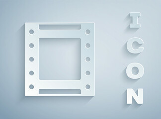 Paper cut Play video icon isolated on grey background. Film strip sign. Paper art style. Vector