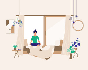 Young Woman At Home With Cozy Living Room Doing Meditation To Calm Her Mind. Relaxation. Stay At Home.