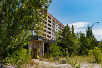 Fototapeta na wymiar Old abandoned house in the ghost town of Pripyat, Ukraine.