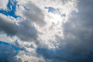 Dark white clouds in a blue sky in bright sunlight in summer, Almere, Flevoland, The Netherlands, August 5, 2021
