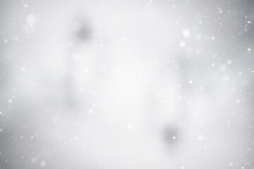 Obraz premium blurred snow / winter abstract background, snowflakes on abstract blurred glowing leaf background