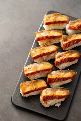 Seasoned eel sushi on a plate