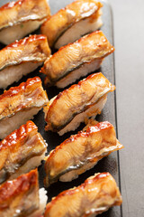 Seasoned eel sushi on a plate