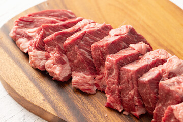 raw meat on a wooden board