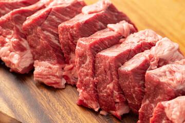 raw meat on a wooden board