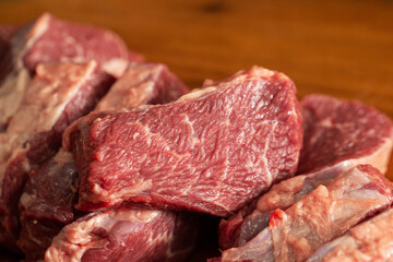 raw meat on a wooden board