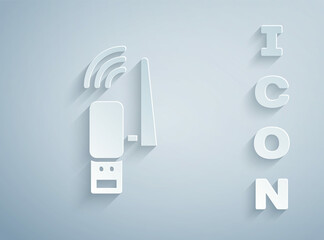 Paper cut Usb wireless adapter icon isolated on grey background. Paper art style. Vector