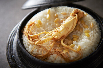 Ripe ginseng on cast iron pot rice