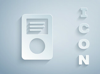 Fototapeta premium Paper cut Music player icon isolated on grey background. Portable music device. Paper art style. Vector