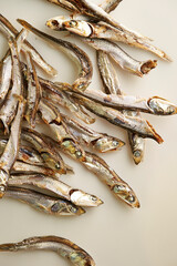 dried anchovies on a white background 