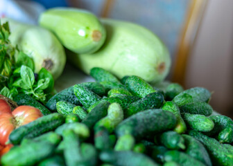 color photo with autumn vegetables on the table, different colors, shapes and types of vegetables prepared for home canning, autumn harvest time