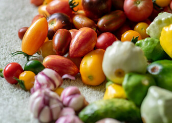 color photo with autumn vegetables on the table, different colors, shapes and types of vegetables prepared for home canning, autumn harvest time