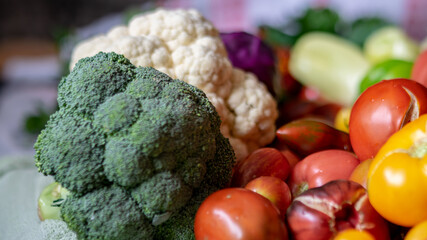 color photo with autumn vegetables on the table, different colors, shapes and types of vegetables prepared for home canning, autumn harvest time