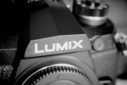 Chernihiv, Ukraine. June 21, 2021. Fragment of a Panasonic Lumix camera, close-up. Lumix logo on the camera. Illustrative editorial.