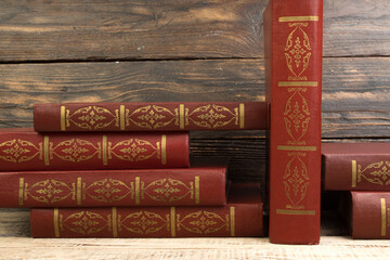 Fototapeta premium books on wooden table. Back to school. Education business concept. Copy space for text.