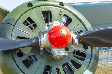 Propeller and engine of historical vintage airplane.