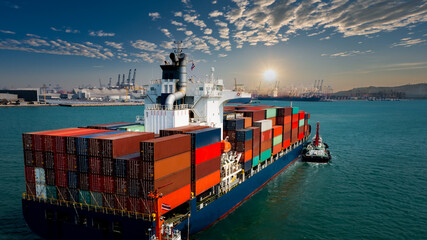 container cargo ship carrying commercial container in import export business commerce logistic and transportation of international by container ship at morning over the sunlight