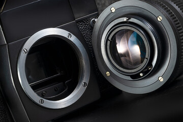 Camera Lens mount. M42-mount camera system. Old threaded lens mount technology. Camera and lens..