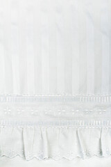 Obraz premium background of white embroidered fabrics, decorative lace.