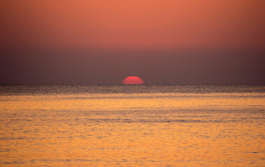 Sunrise over the sea water, beautiful natural backgrounds