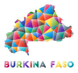 Burkina Faso - colorful low poly country shape. Multicolor geometric triangles. Modern trendy design. Vector illustration.
