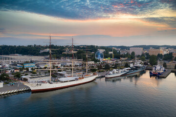 Harbor in Gdynia with the sailboat at sunset. Poland