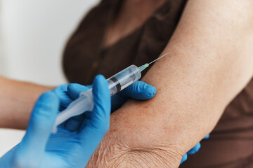 Fototapeta na wymiar a shot in the patient's arm immunity protection vaccine passport