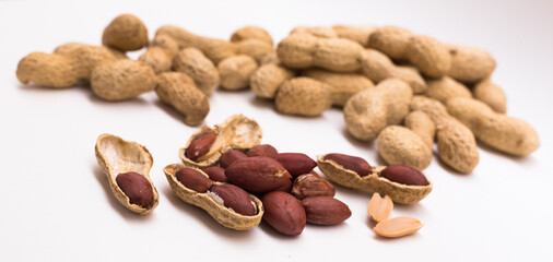 Fototapeta na wymiar peanut kernels on a white background