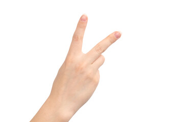 Hand gesture victory sign, two fingers, isolated on a white background, young female hand close-up