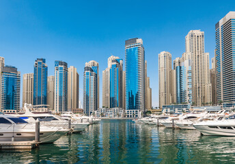Naklejka na ściany i meble Dubai, UAE. Marina modern buildings near the channel in Dubai.