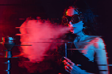 Hookah atmosphere. The girl enjoys smoking a hookah, sheesha. Surrealism