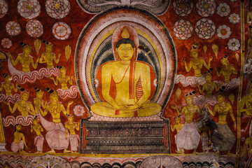 Buddha painted inside Dambulla cave temple in Dambulla, Sri Lanka. Cave III Maha Alut Viharaya.