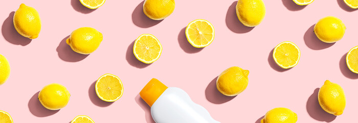 Sunblock bottle with yellow lemons