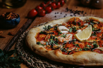 Frutti di Mare pizza on a wooden table napoletana pizzeria meal table