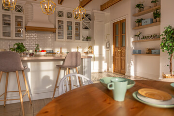 modern expensive luxurious open-plan apartment. Rich Scandinavian-style interior with wooden beams on the ceiling in pastel colors