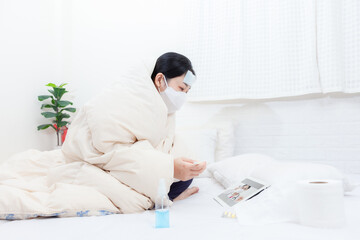 Woman patient examines body temperature during consultation with smart doctor. Sick woman in bed...