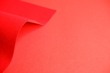 Red background. Red cardboard texture.