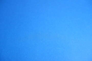 Blue background. Blue cardboard texture.
