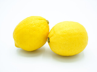 2 lemons, white background, top view