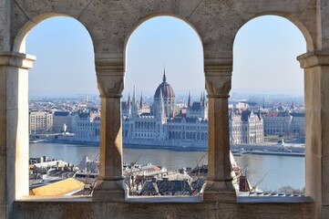 Hungarian Parliament Building also known as the Parliament of Budapest, This place is the seat of the National Assembly of Hungary. View from the window of Fisherman's Bastion.