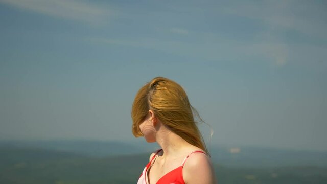 woman in the wind