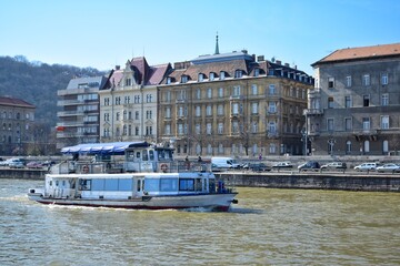 Tour boats take tourists to see the scenery of the Danube River building in Budapest, HANGARY.