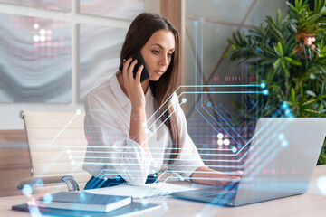 Attractive businesswoman in white shirt has conference call to optimize development by implying new technologies in business process. Hi tech hologram over office background
