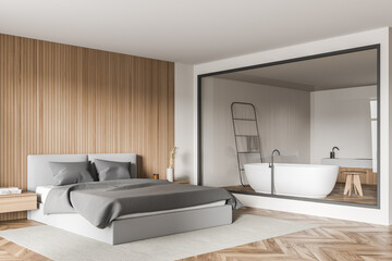 Fototapeta na wymiar Modern bedroom with glass wall of bathroom and parquet floor. Corner view