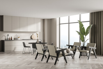 Seating area and panoramic windows in neat beige kitchen design